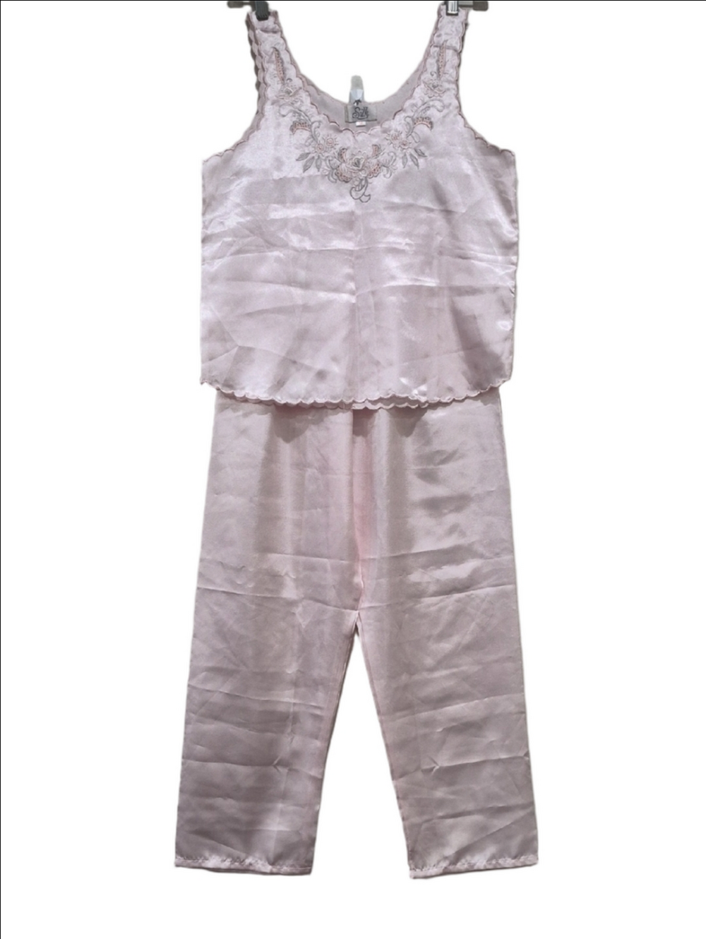 Vintage-style silk lingerie pajama set with embroidered floral details.